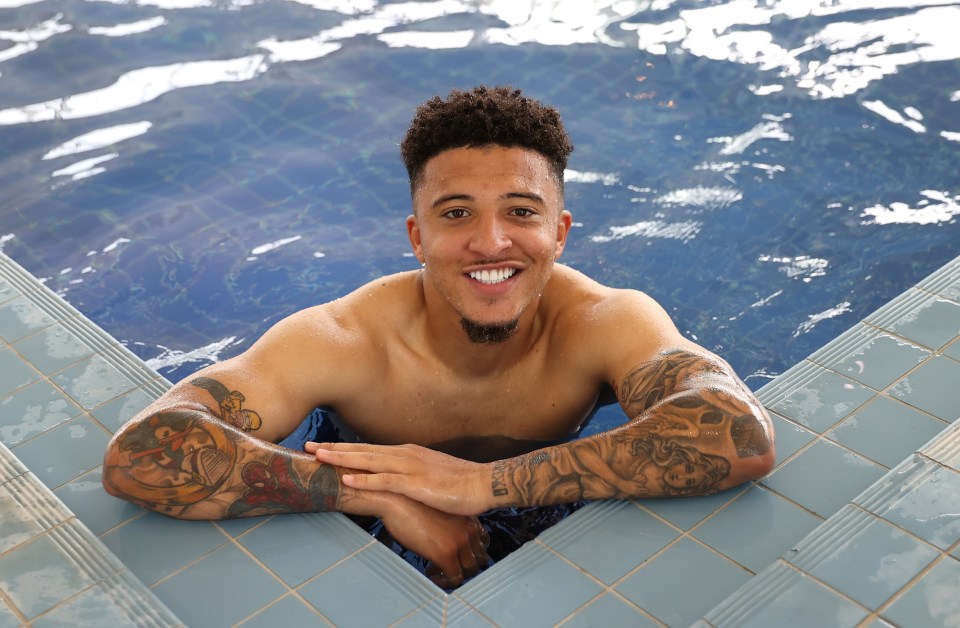 Jadon Sancho relaxes in the pool ahead of England quarter-final at Euro 2020