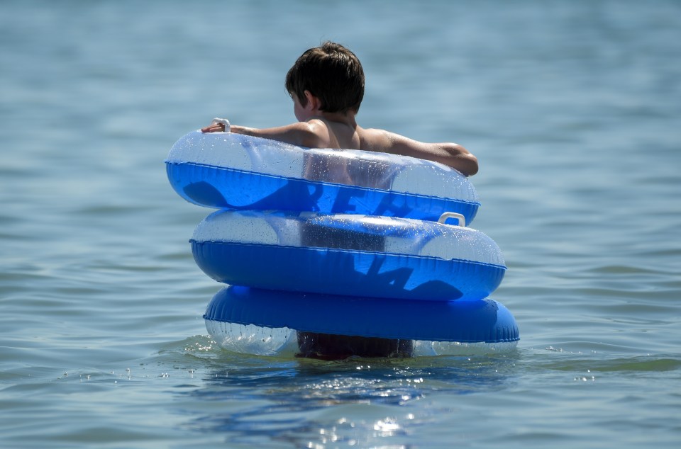 Kids were splashing in the sea and enjoying the hot weather