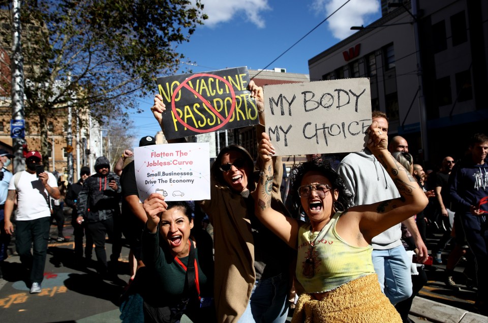 Protesters march down George Street, Sydney