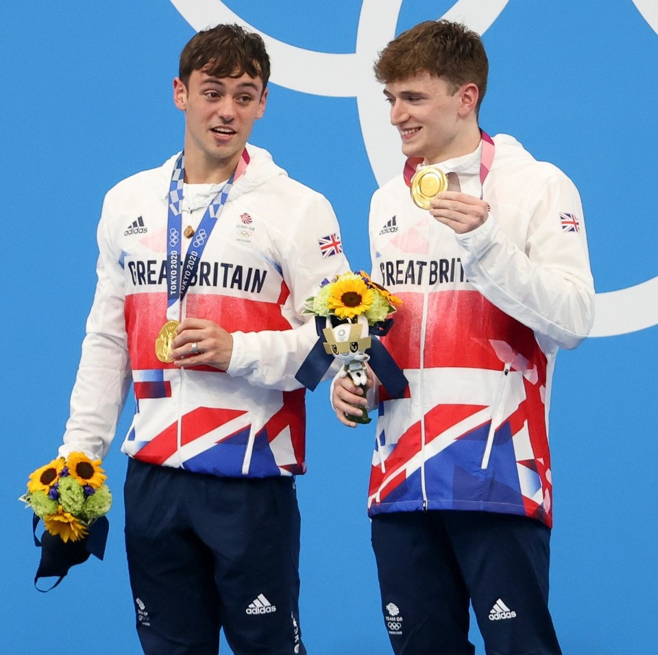 Tom Daley celebrates gold with Team GB diving partner Matty Lee after watching rivals  Cao Yuan and Chen Aisen not quite do enough