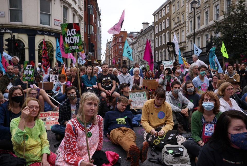 Extinction Rebellion protesters take part in a protest in Covent Garden