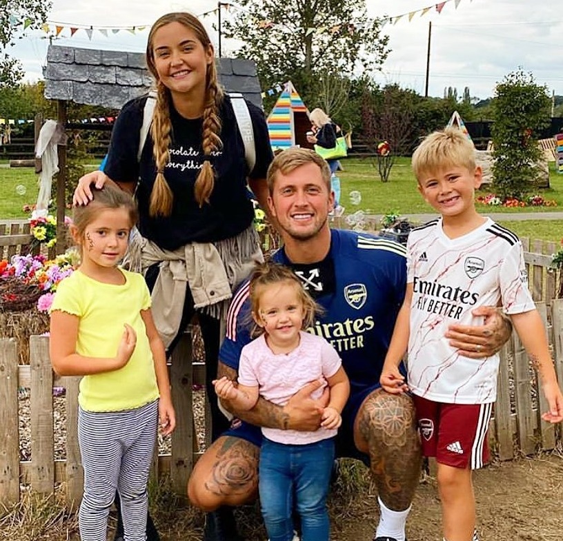 The devoted parents with Ella, left, Mia, middle, and Teddy, right - Dan's son from a previous relationship