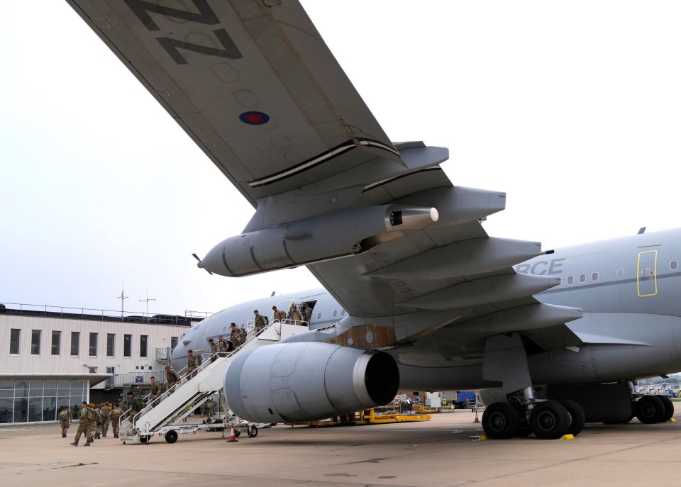 Troops poured out of planes following the airlift