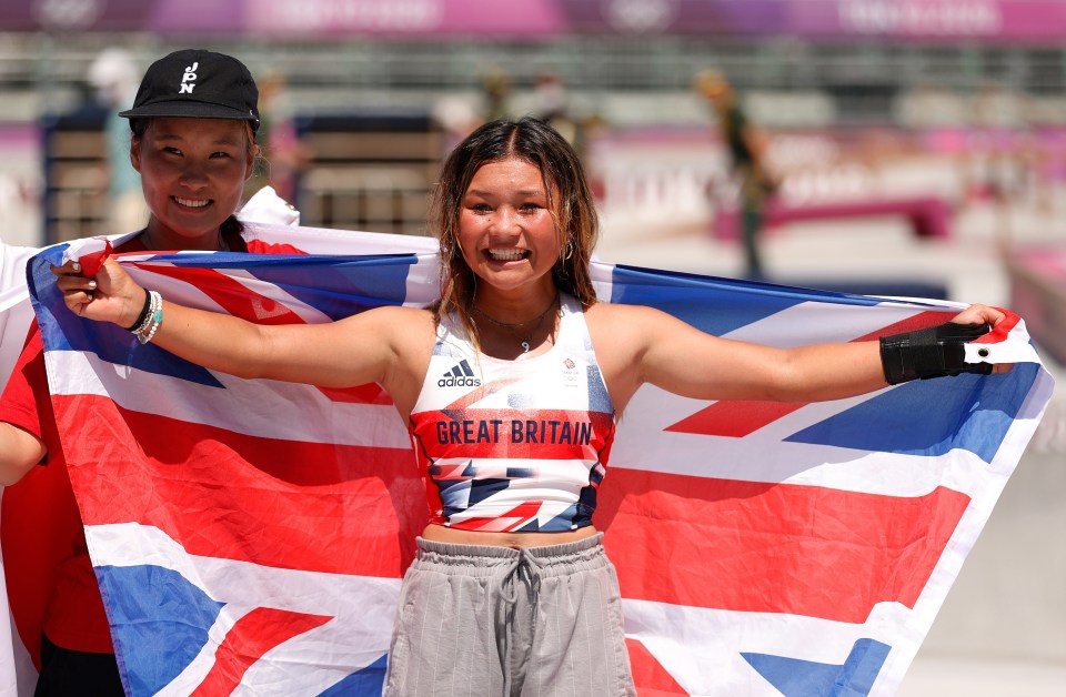 A jubilant Sky Brown celebrates with the Union Jack