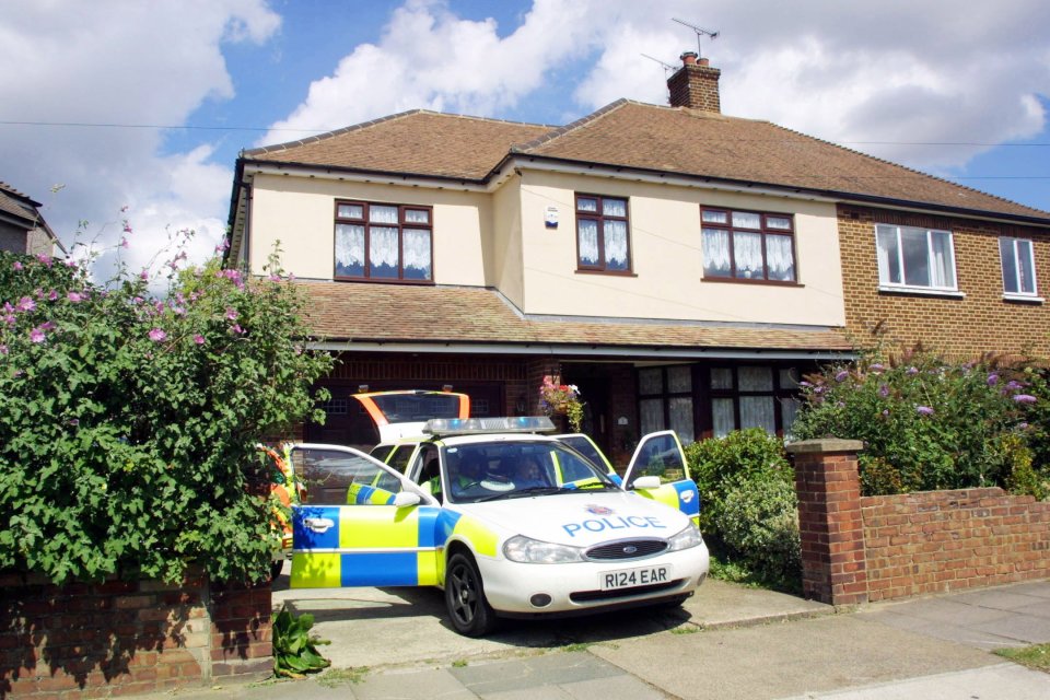 Essex Police pictured outside the house of Stuart Campbell after his arrest