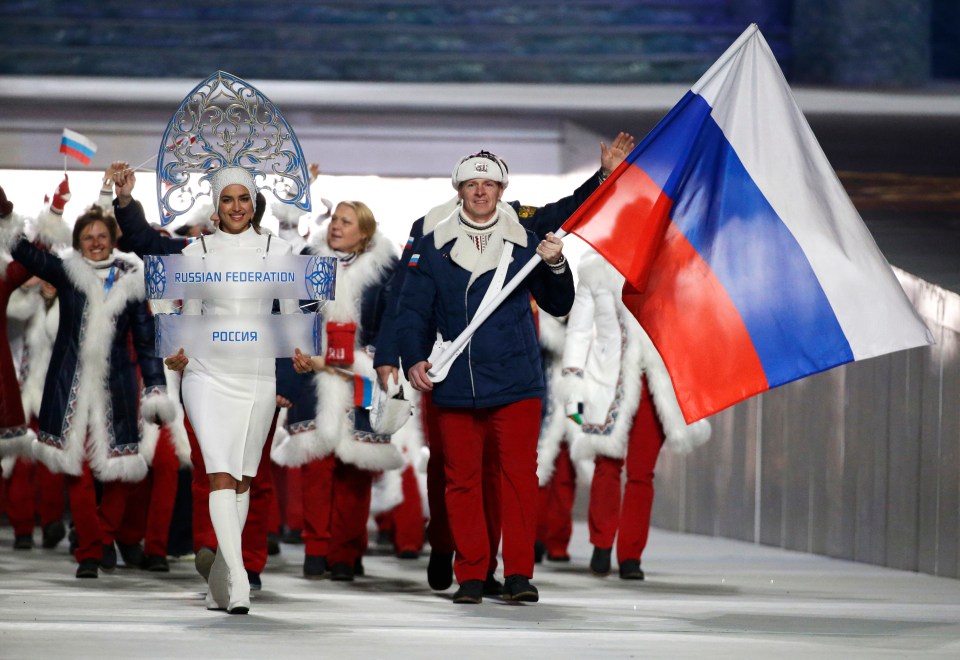 Alexander Zubkov leads the Russian athletes at Sochi’s opening ceremony