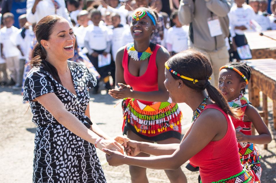 The Duchess of Sussex with dancers in Cape Town, South Africa