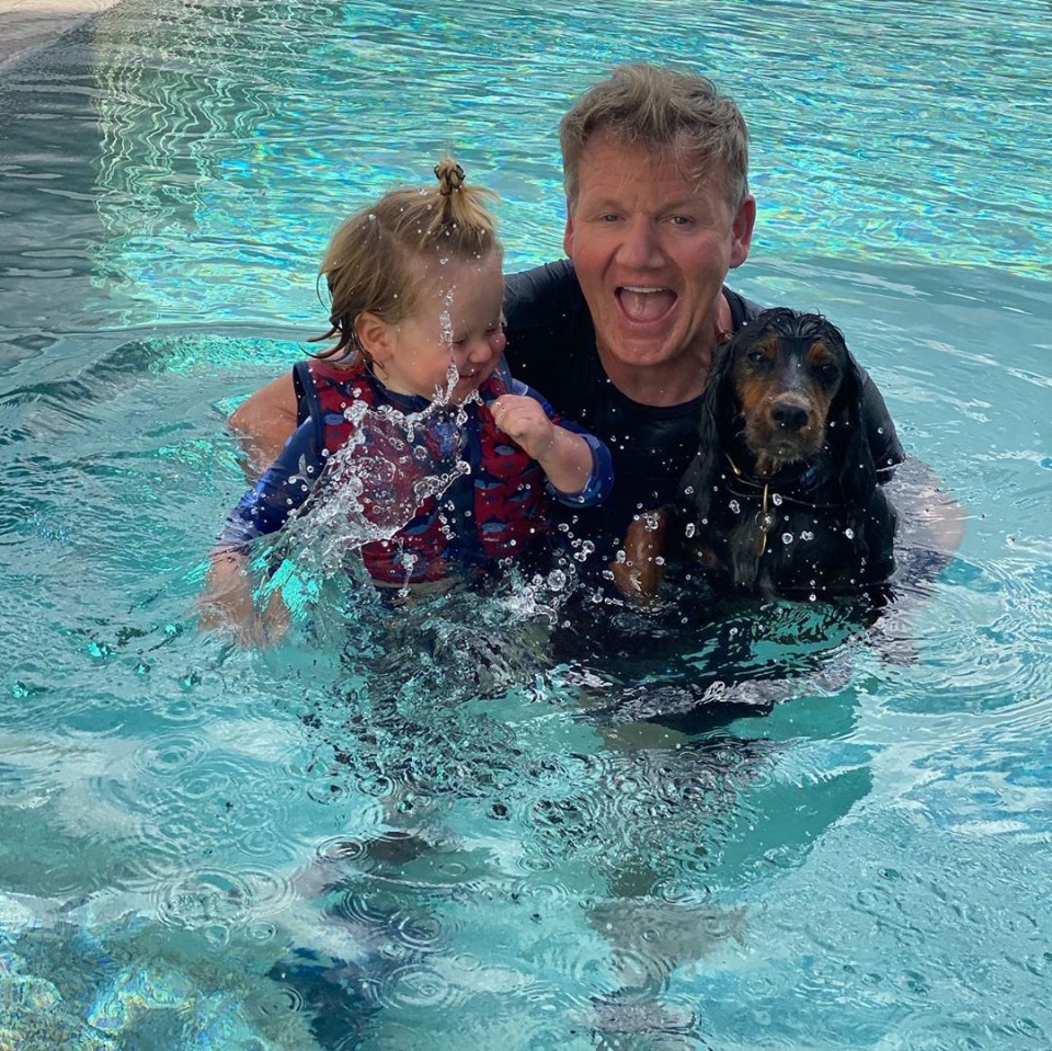 Gordon splashes around with his toddler