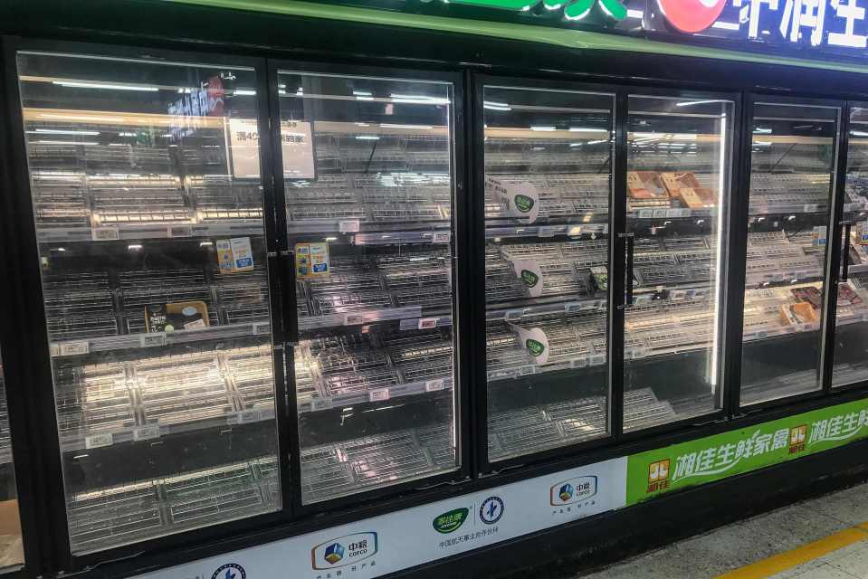 Empty shelves at a supermarket in Wuhan amid fears of further lockdowns