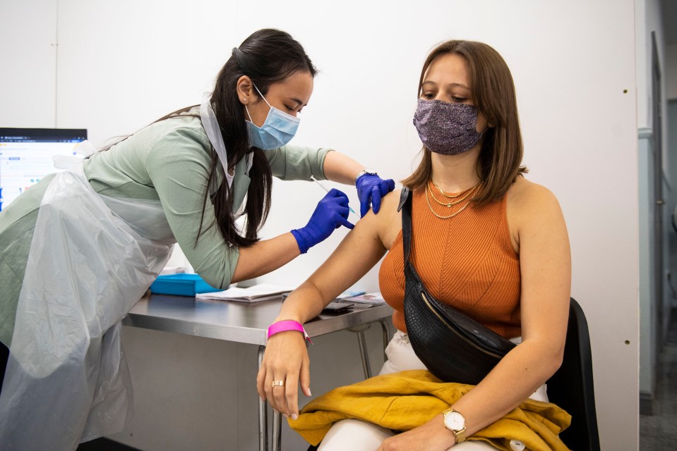 Vaccines appear not to be as effective against the Delta Covid strain, and a new one seen most in Colombia. Pictured: Harley Barron received her Covid vaccine at St Boniface Church, Tooting