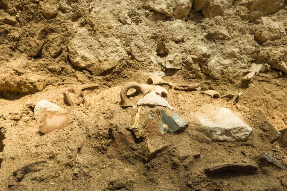 The excavation uncovered a string of artifacts including pottery, oil lamps and even small tables