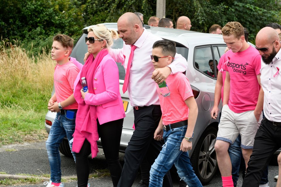 Frank's loved ones donned his favorite colour, pink, for his funeral