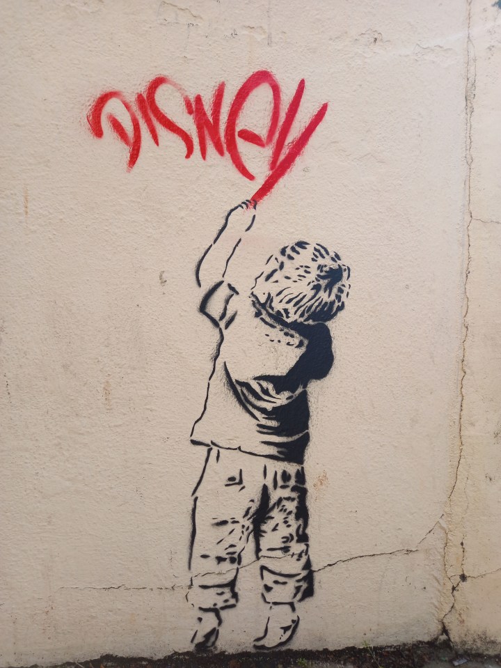 It comes after another potential Banksy painting showed a boy scribbling ‘Disney’ on a wall