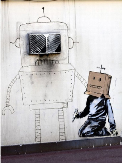 Another picture shows a boy drawing a robot with a cardboard box on his head