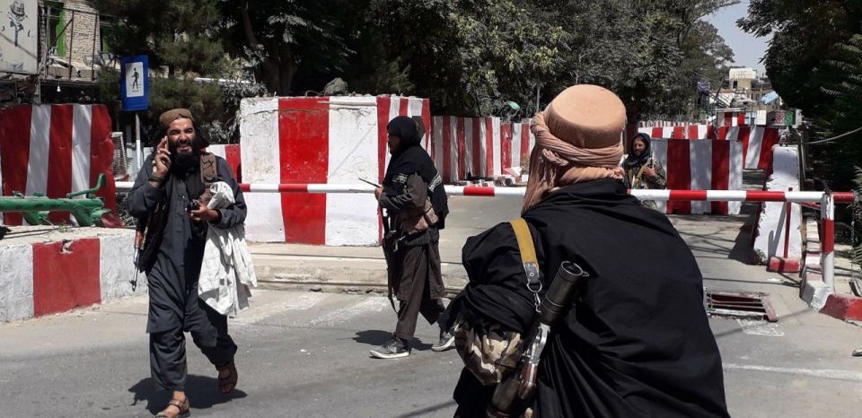 Gun-toting Taliban fighters smile after taking Ghazni