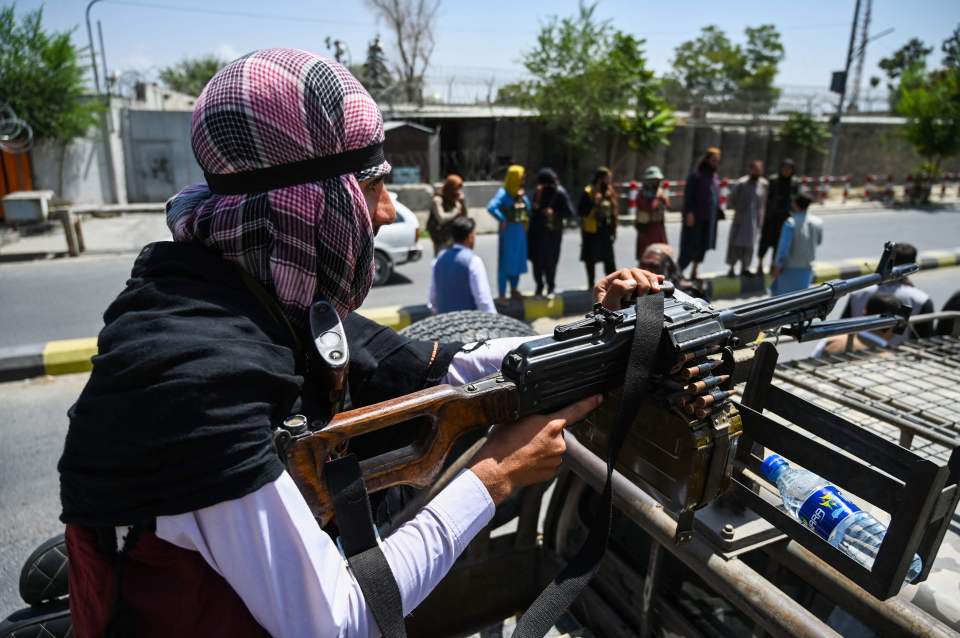 Taliban fighters out on the streets of Kabul after taking control