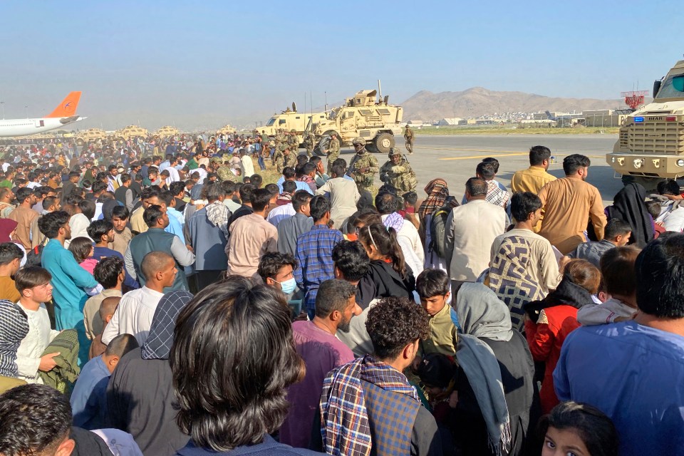 US troops guarding the perimeter following chaotic scenes yesterday