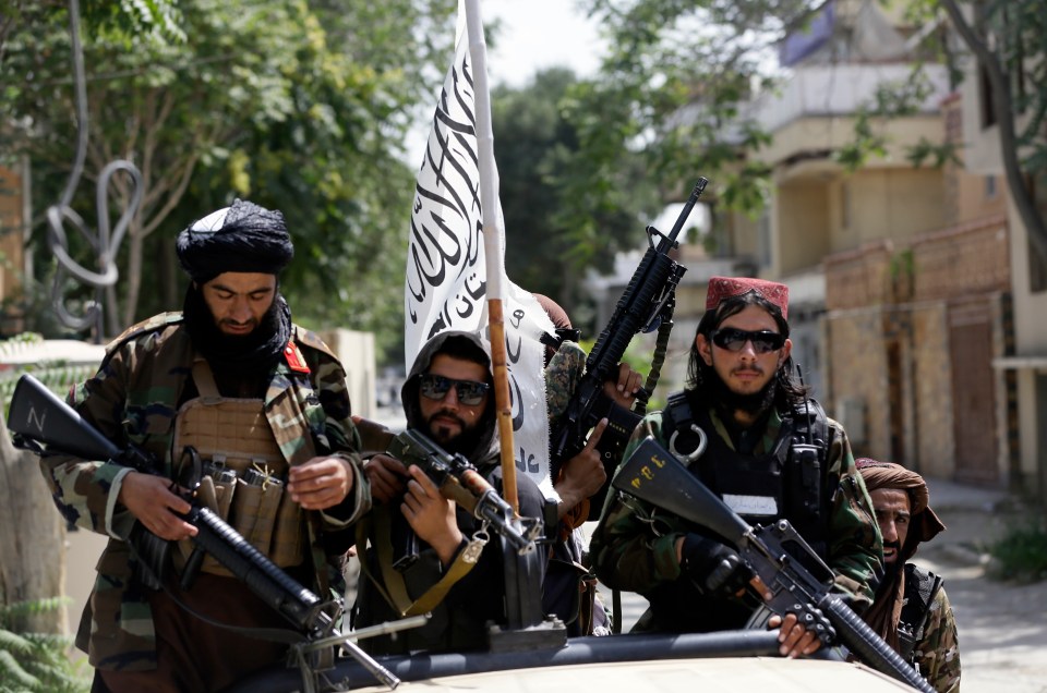 Taliban fighters on patrol in Kabul on Thursday