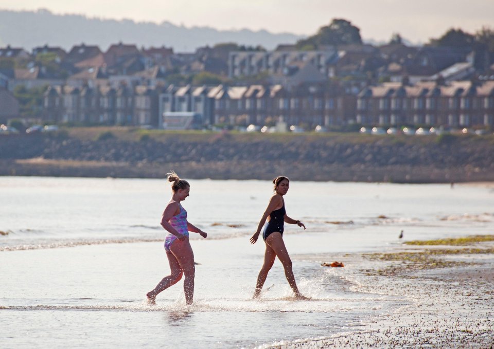 Swimmers in the sea in Edindurgh