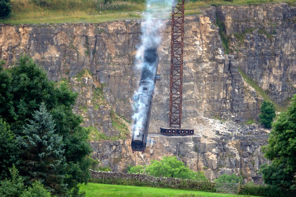 The stunning photos were taken on set for Mission Impossible 7 at a disused quarry in the Peak District, Derbyshire