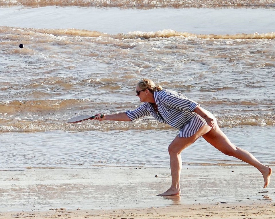 Anne-Marie impressed with her beach ball skills