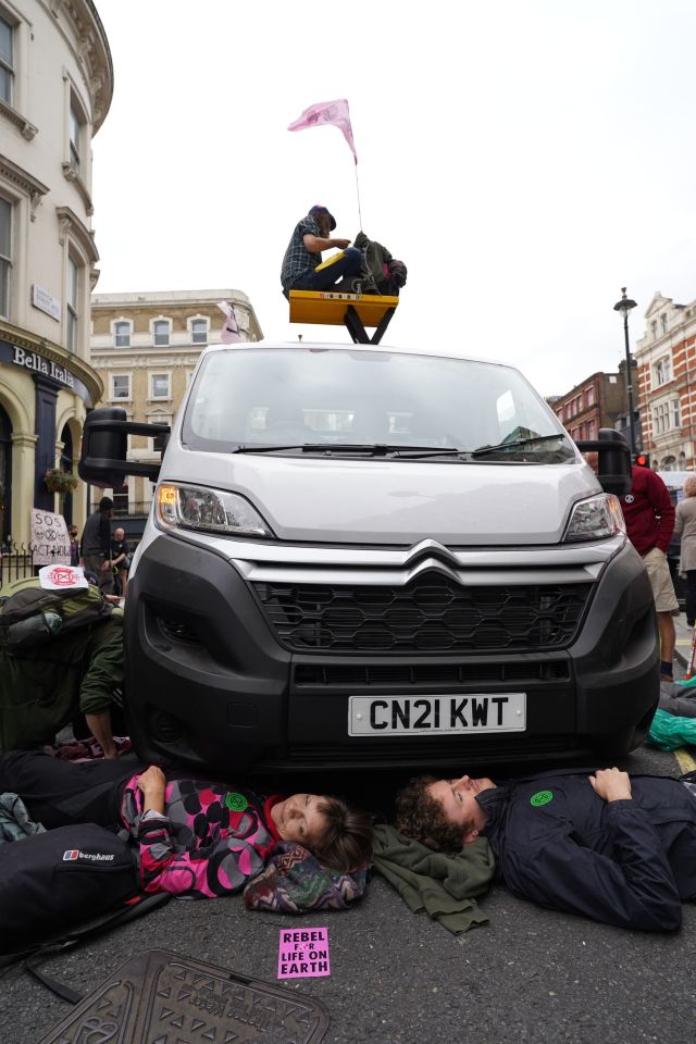 Protesters are seen blocking traffic