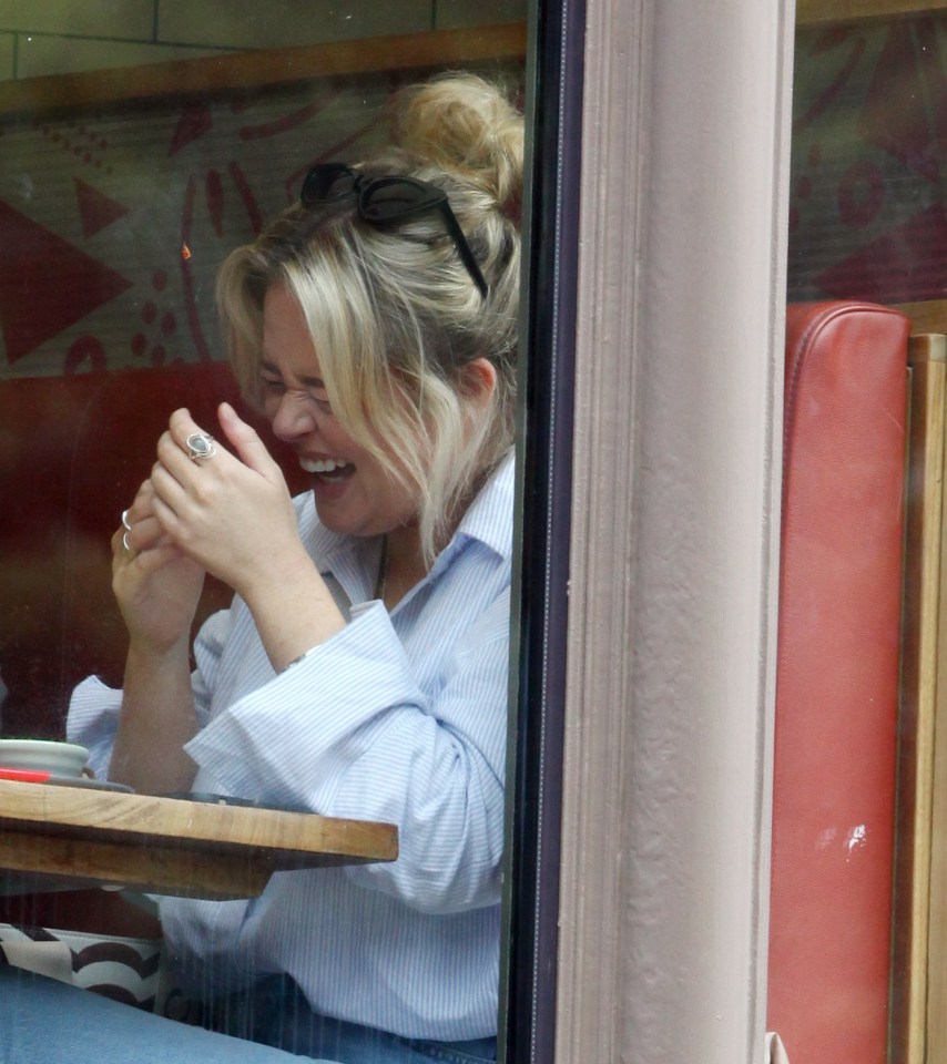 Emily couldn't contain her laughter at the pair enjoyed their meal