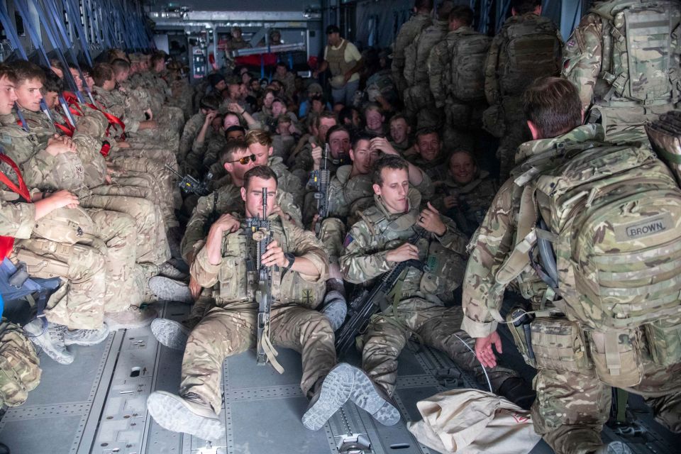 British troops onboard an aircraft leaving Kabul on Sunday