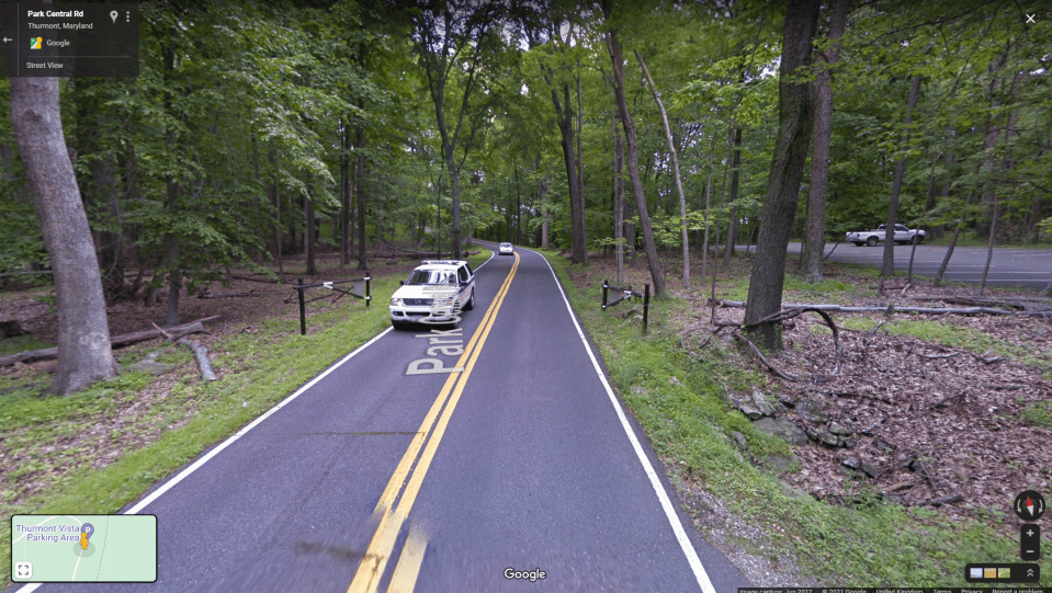 After the ‘chase’ goes on for a few hundred yards, the camera feed appers to show the street view car cross the road as it pulls into a parking lot. The feed then cuts out