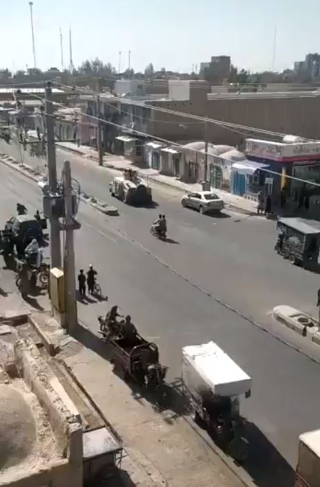 The Taliban parade through the streets after seizing Zaranj