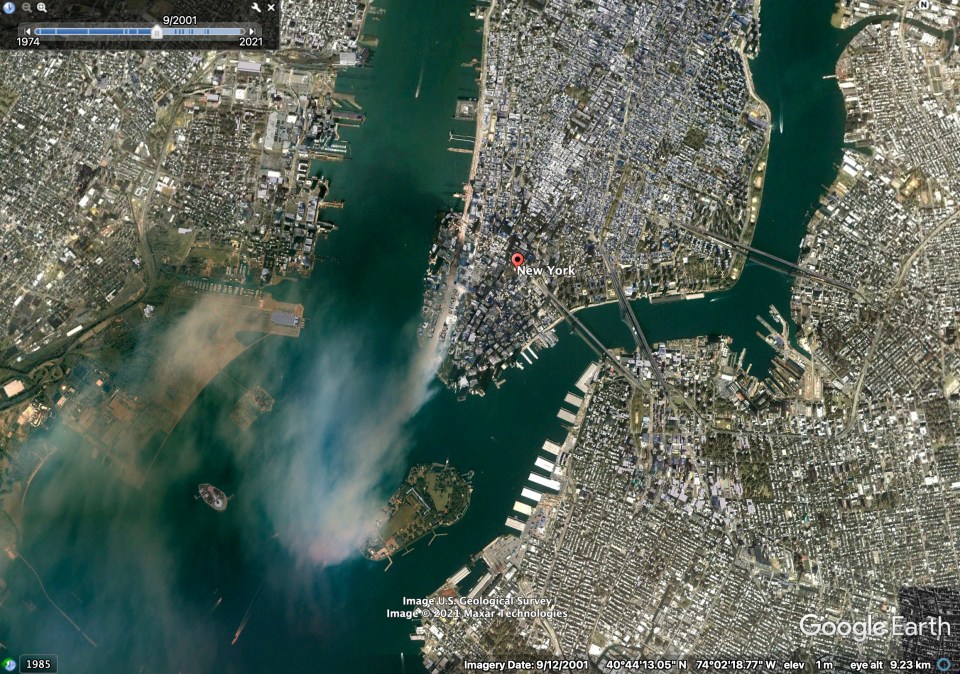 Smoke billows from the World Trade Centre on September 11, 2001, in a satellite image available on Google Earth