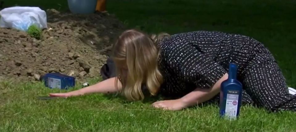 Liv drinks by Leanna's grave side