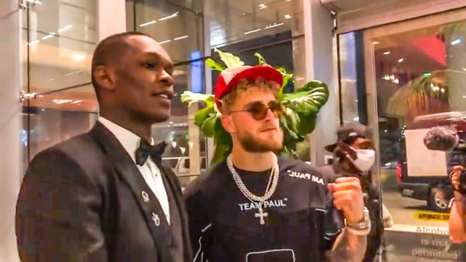 UFC middleweight champion Israel Adesanya with Jake Paul