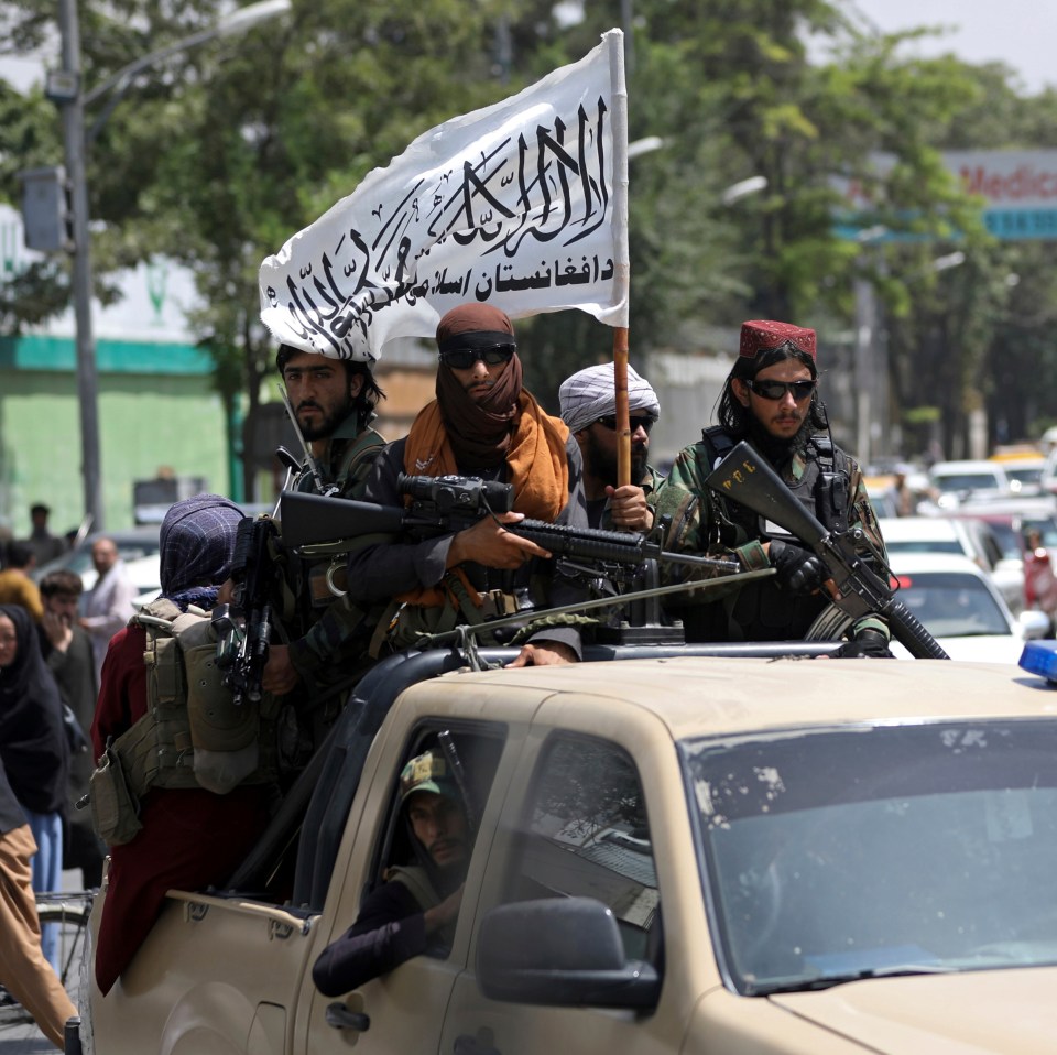 Taliban fighters have been raising their distinctive flag across Afghanistan