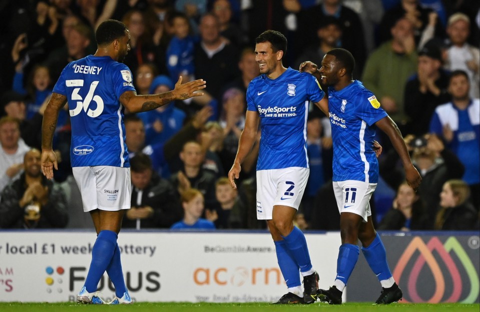 Jeremie Bela (right) celebrates after sealing the win for Blues