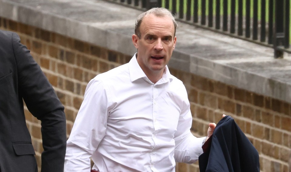 Dominic Raab arrives at Downing Street today ahead of his committee showdown