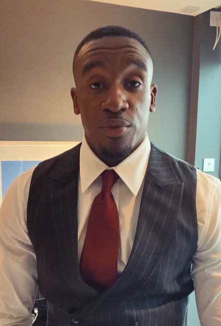 Rapper Bugzy Malone has been cleared of unlawfully punching two men