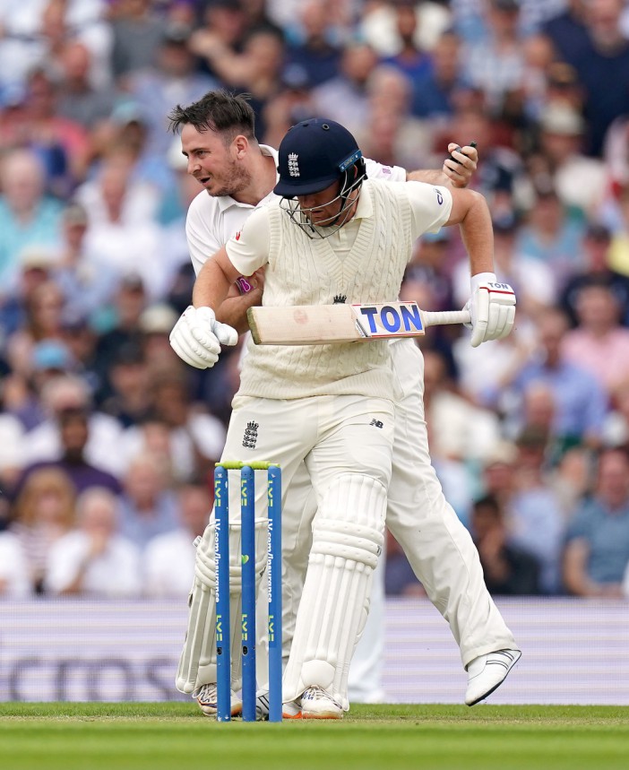 The pitch invader clattered into Jonny Bairstow moments after releasing the ball