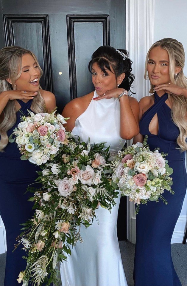 Molly pictured with her sister Zoe and her mother Debbie on her wedding day in May