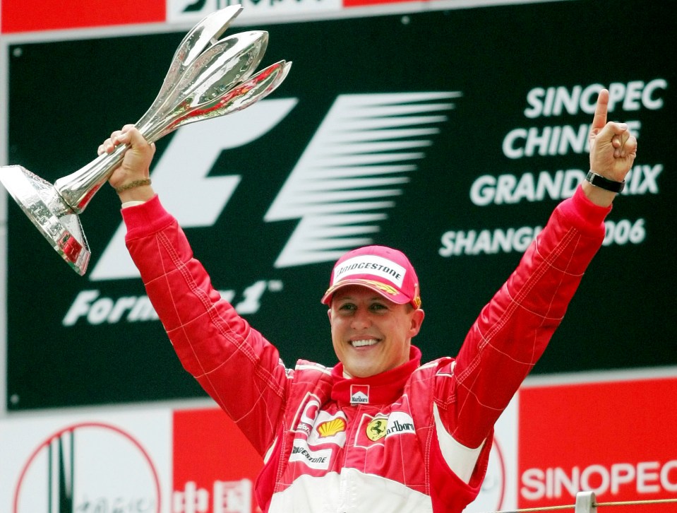 The F1 legend celebrating winning the Formula One Chinese Grand Prix auto race at the Shanghai International Circuit in 2006