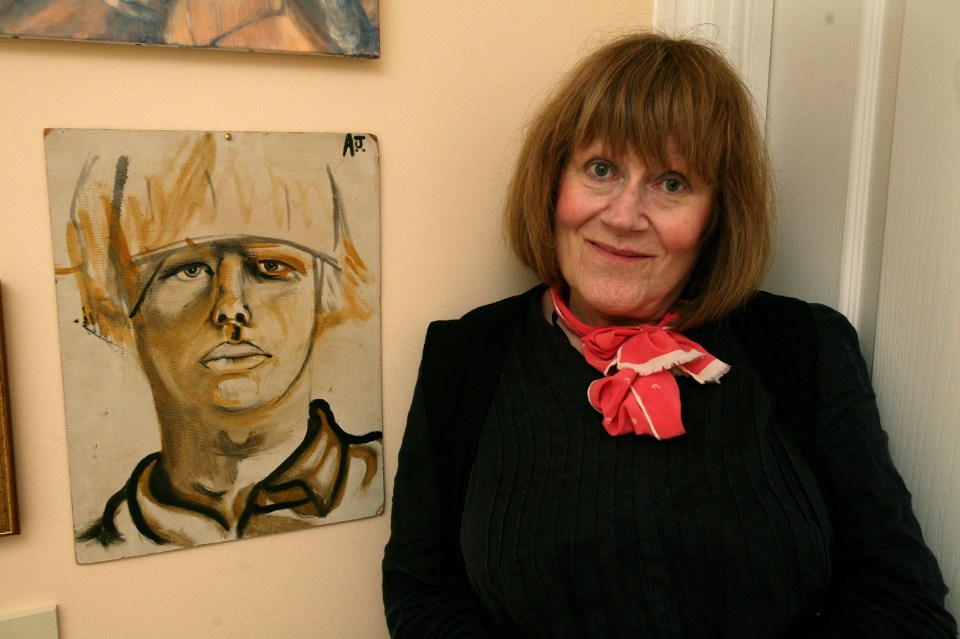 Charlotte at her studio in Notting Hill with a self-portrait painted by Boris when he was 14