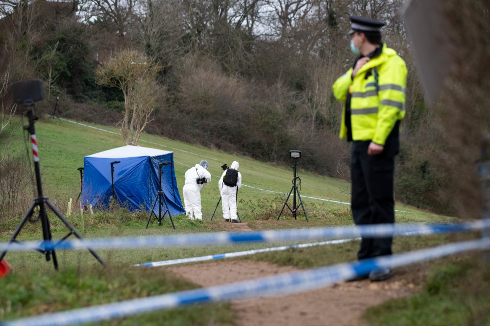 Police are seen by a cordon following Olly’s killing