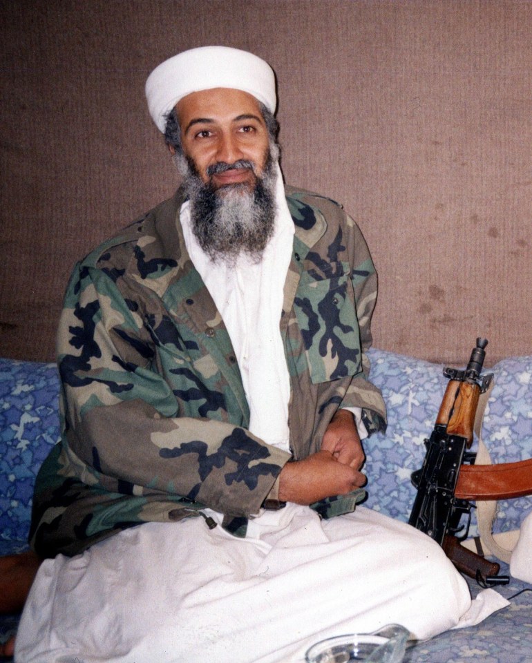 Grinning mass murderer Osama bin Laden masterminded the attack