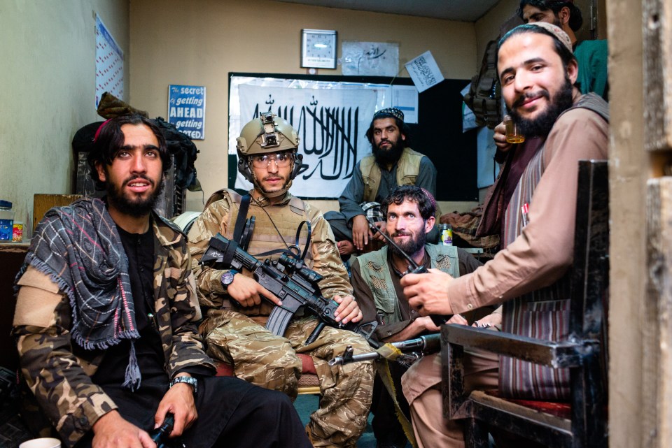 Taliban fighters show off some of their haul