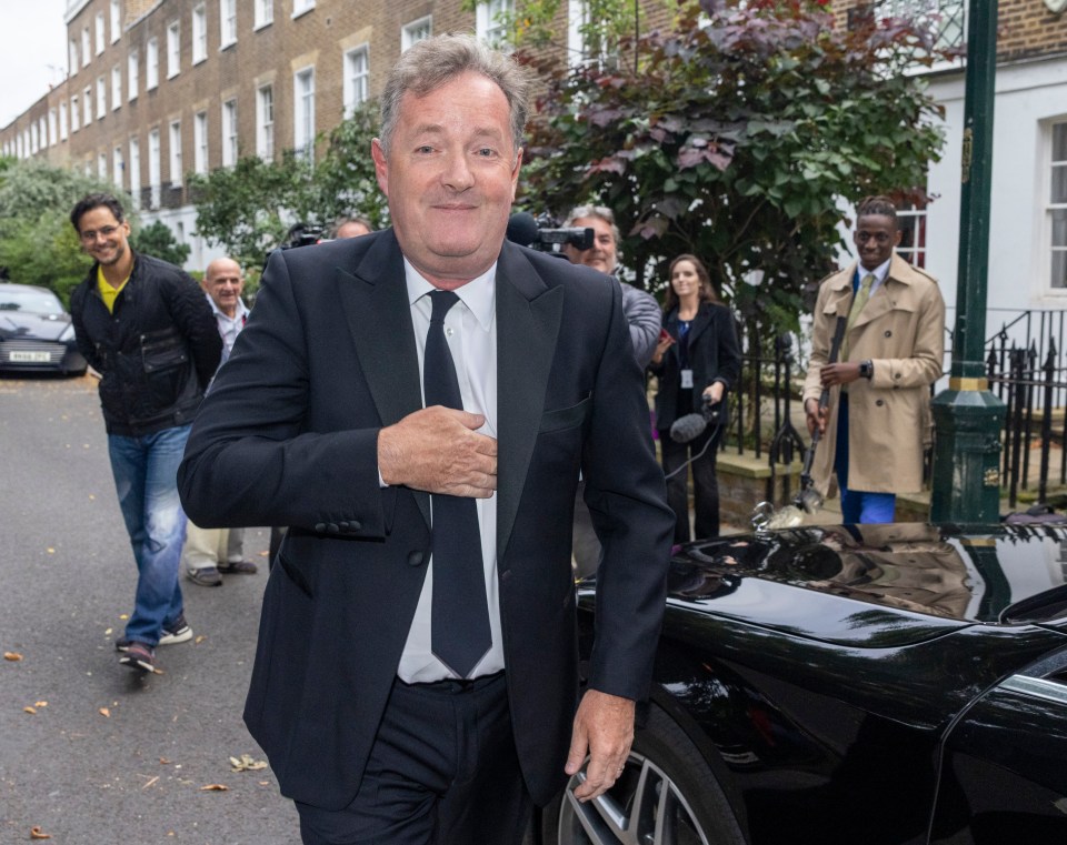 A jubilant Piers pictured leaving his home after being cleared by Ofcom for comments he made about Meghan Markle on GMB