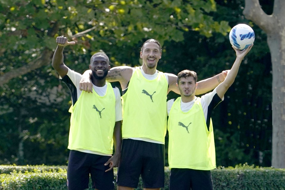 Fikayo Tomori, Zlatan Ibrahimovic and Brahim Diaz celebrate winning foot-golf in training