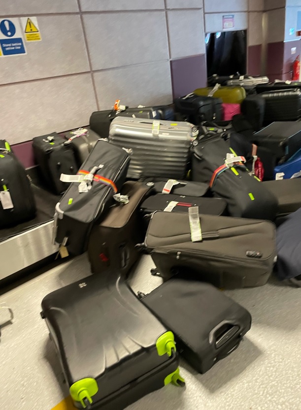 Piled up luggage at Manchester Airport today as holidaymakers were hit with chaos