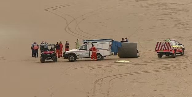 Paramedics attempted to revive the man on the sand