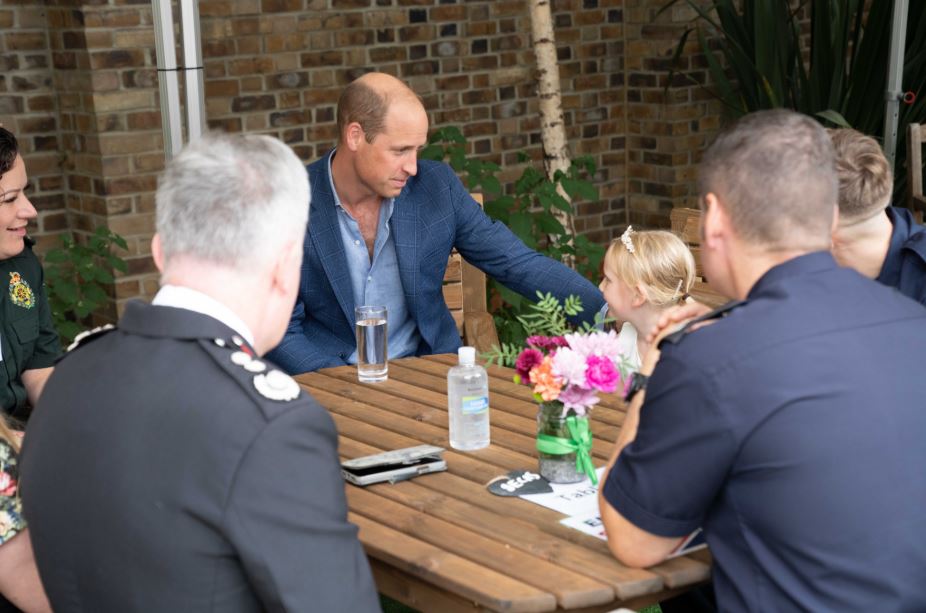 Prince William seen chatting with five-year-old Lila, who was saved by blue light heroes