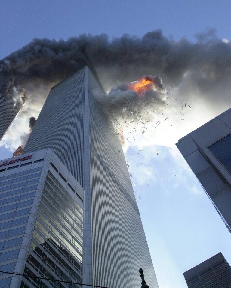 Flames spew out of 2 World Trade Center after it is struck by a commercial airliner in a terrorist attack on September 11, 2001